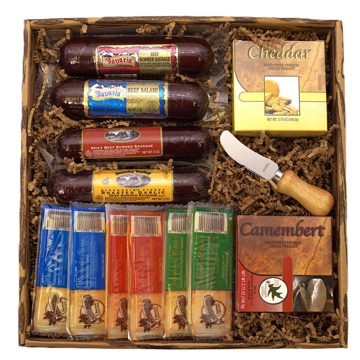 Wooden gift box with sausages, cheddar and camembert cheese, and a cheese spreader