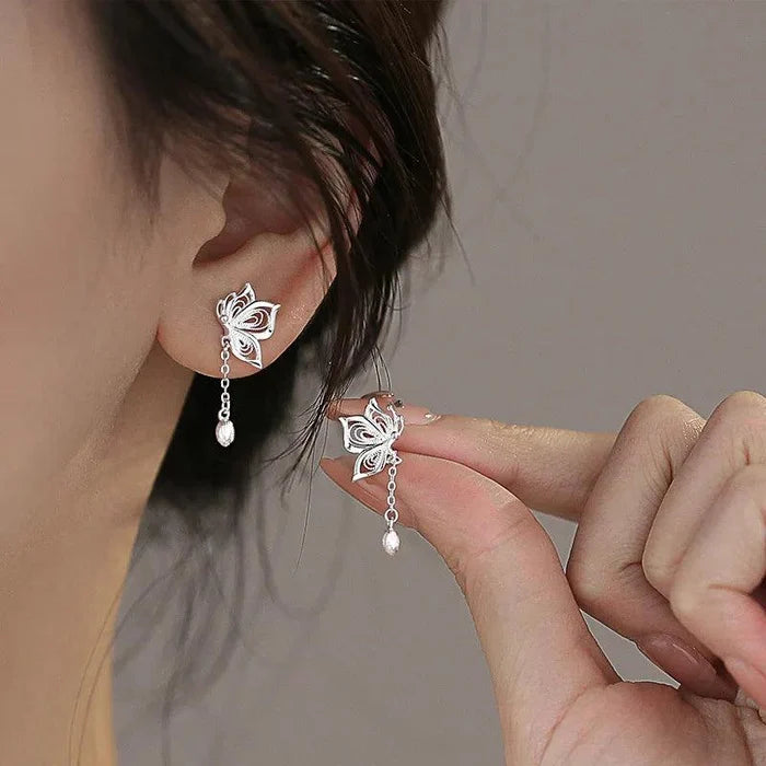 Silver butterfly stud earrings with long dangling chain and teardrop charm