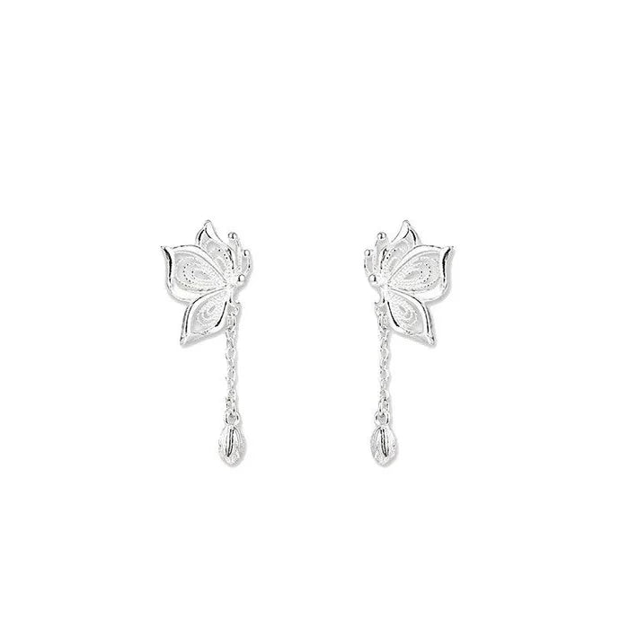 Silver butterfly stud earrings with dangling chain and teardrop charms