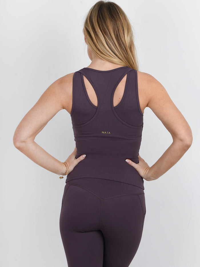 Simone Tipped Vest in  Fig colour from NAIA active - active wear collection worn with the simone tipped legging