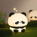 Panda-shaped LED night light with glowing white face and round body