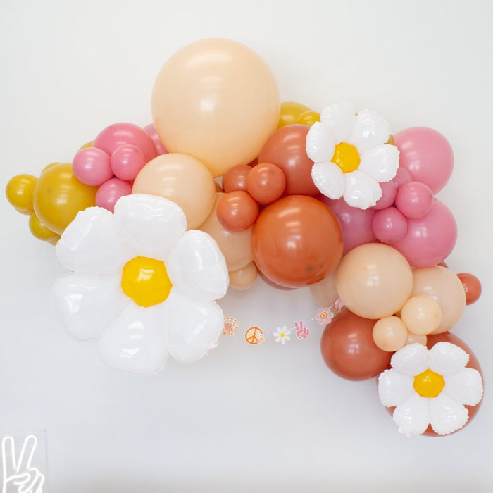Pastel balloon cluster with white daisy foil balloons and yellow centers