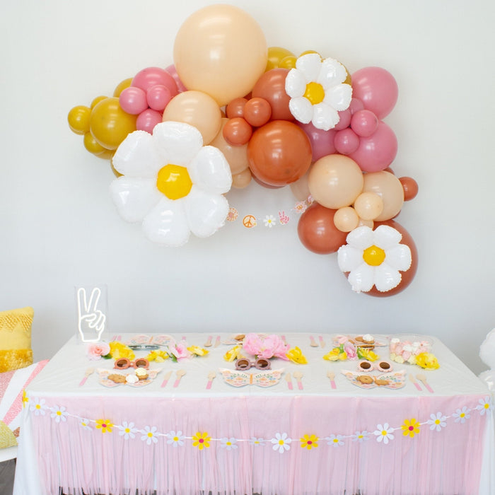 Pastel balloon garland with three white daisy foil balloons and yellow centers