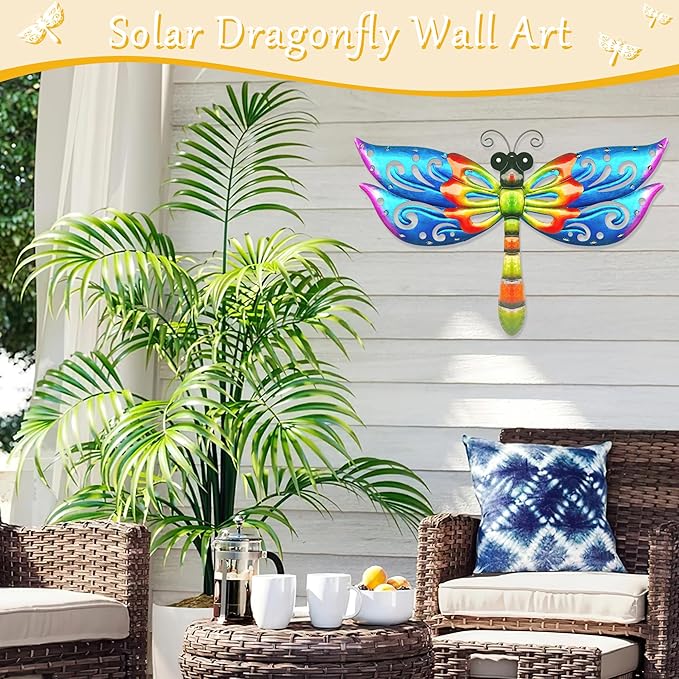 Blue, orange, and green metal dragonfly wall art with glowing multicolor LED lights