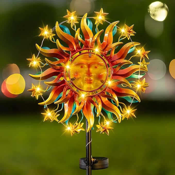 Colorful metal sun yard wind spinner with LED lights on an outdoor stake