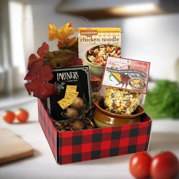 Soup gift box with red-and-black buffalo check sides, leaf decor and soup items