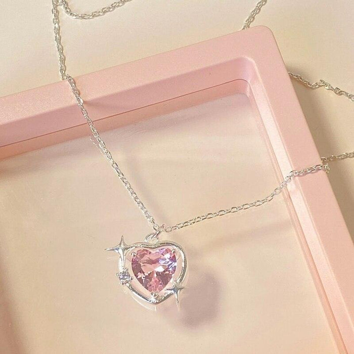 Heart crystal pendant necklace with pink heart crystal in silver, on a fine chain