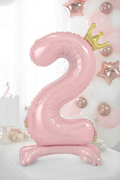 Pink number 2 standing foil balloon with gold crown topper