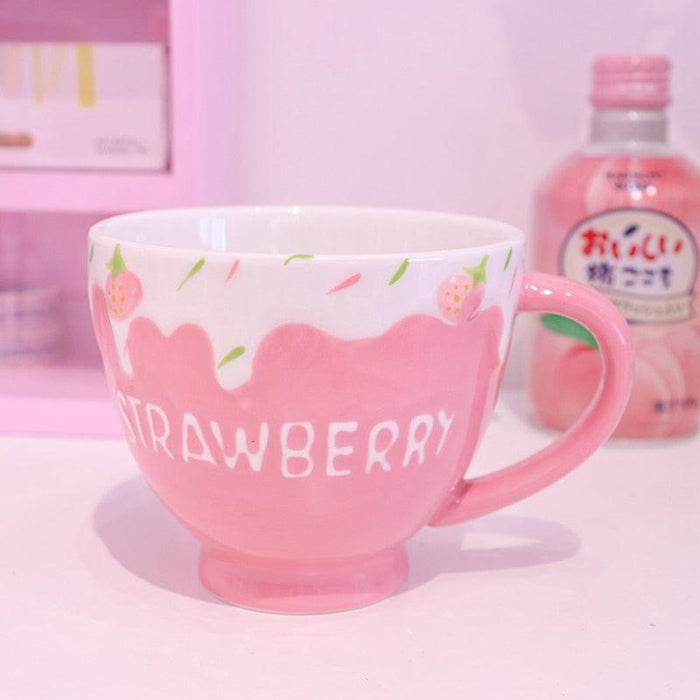 Strawberry milk mug with pink handle and strawberry drip graphic