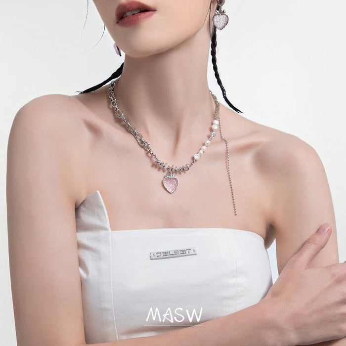 Silver-tone necklace with pink strawberry-heart pendant and pearl drops on chain