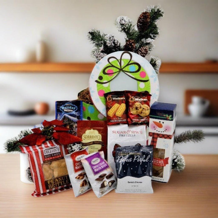 Holiday snack gift tower in round polka-dot containers with bow, cookies, and crackers