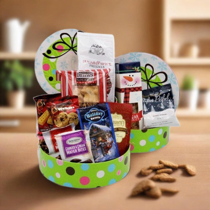 Holiday snack gift tower with polka-dot container holding wrapped cookies and pretzels
