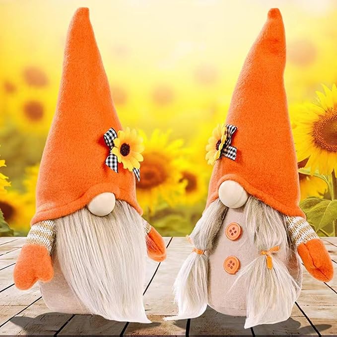 Pair of plush autumn gnomes with orange hats, sunflower pins, white beards, button details