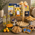 Summer gift basket with lemons, crackers, cookies, chocolates, and ribbon