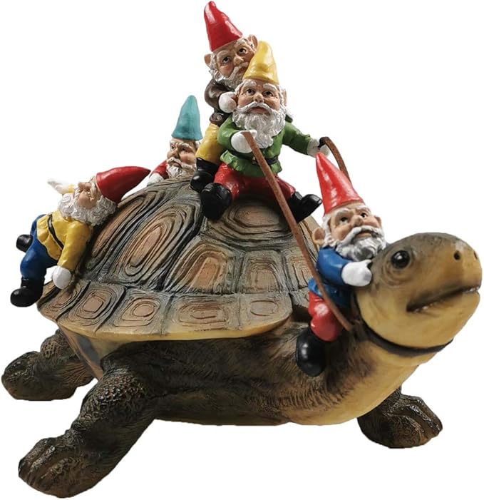 Resin turtle yard ornament with gnomes sitting on its shell, colorful hats and robes