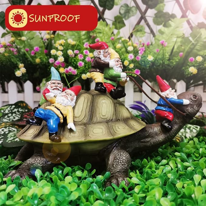 Garden turtle gnome resin figurine with gnomes on shell among green plants
