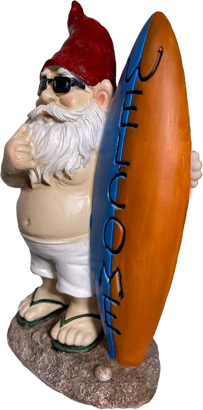 Surfing garden gnome statue with surfboard, red hat, white beard, sandals and trunks