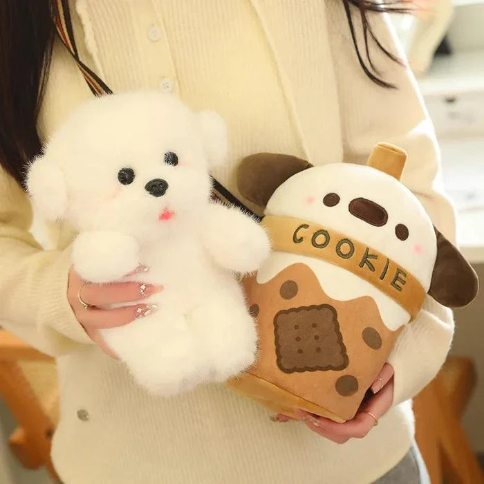 Cookie puppy drink plushie bag held in hand; white face and brown cookie print