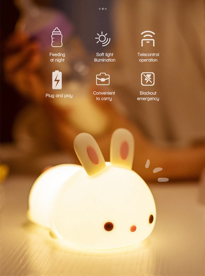 Glowing bunny night light with control icons for feeding light, and power modes.