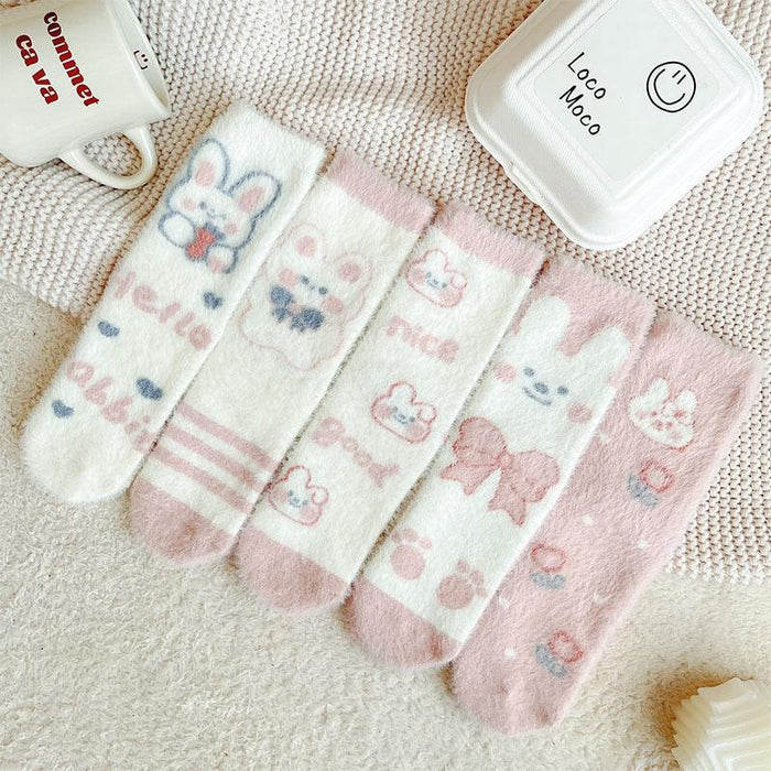 Four-pack of pastel bunny socks with embroidered faces and striped toe bands