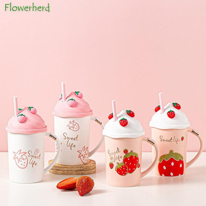 Set of four strawberry lidded mugs with straws in light pink and white