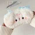 Plush puppy pencil bag with white fur and light blue bow, pink badge front