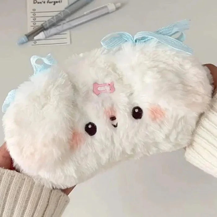 Plush puppy pencil bag in white plush with light blue bow and stitched face