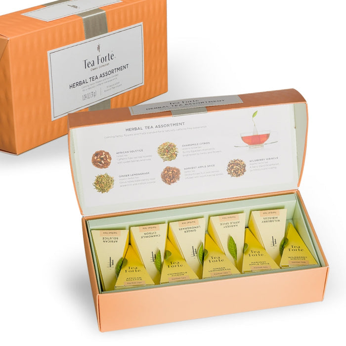 Open herbal tea assortment box with individual tea cartons inside