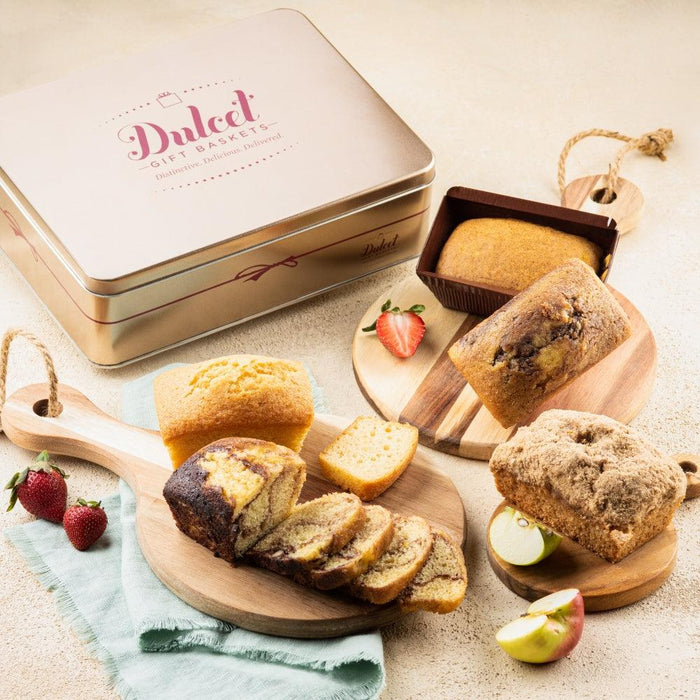 Tea loaf assortment in a gift basket with whole and sliced loaves