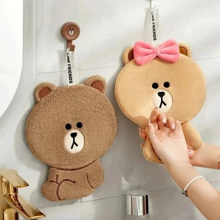 Pair of teddy bear hand towels with bear faces, tan-brown and light-brown styles