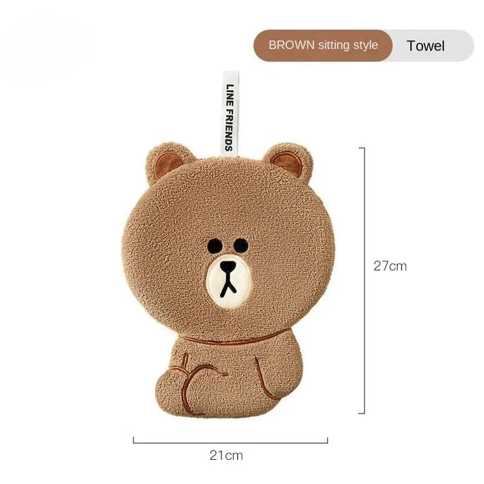 Brown sitting teddy bear hand towel with stitched bear face and small outline seams
