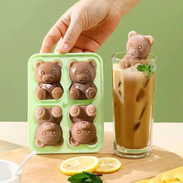 Teddy bear ice mold with four bear-shaped compartments and paw detail cavities