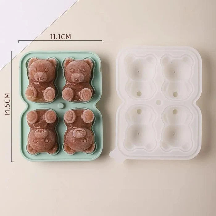 Teddy bear ice mold set showing four bear-shaped cavities in green and clear