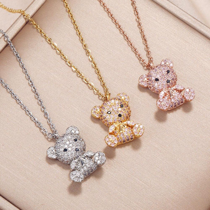Gold-tone teddy bear pendant necklace with sparkling bear charm