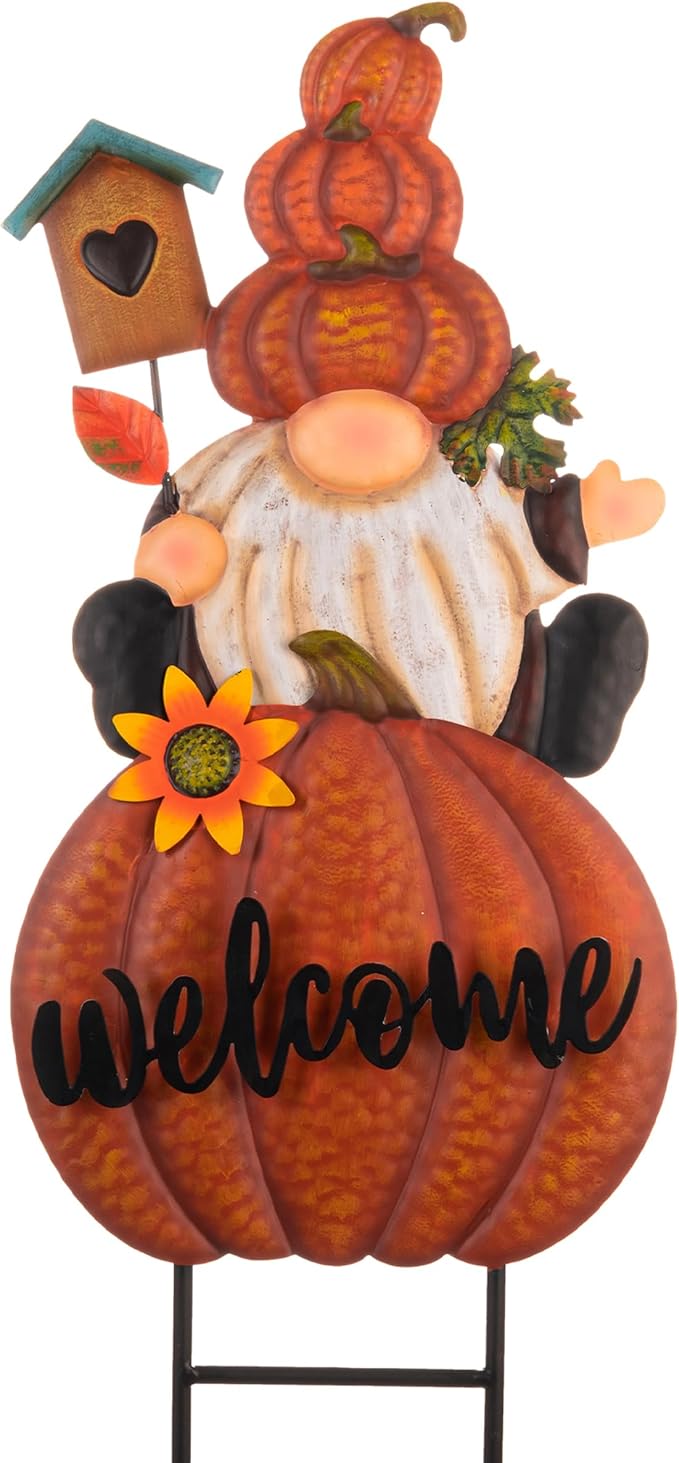 Orange pumpkin welcome gnome yard sign with sunflower, teal house, and metal stake base.