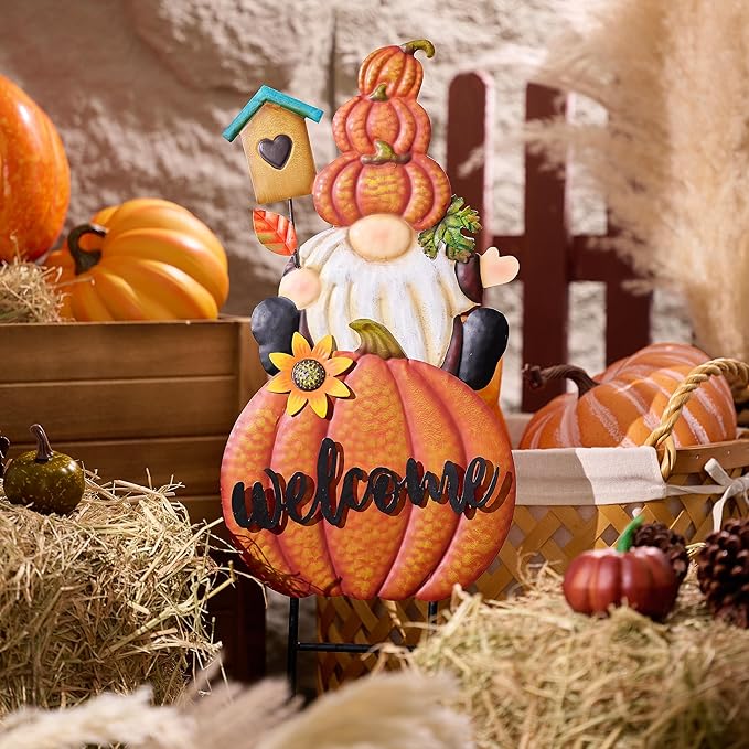 Orange pumpkin welcome gnome yard sign with sunflower, teal house, black boots, metal stake.