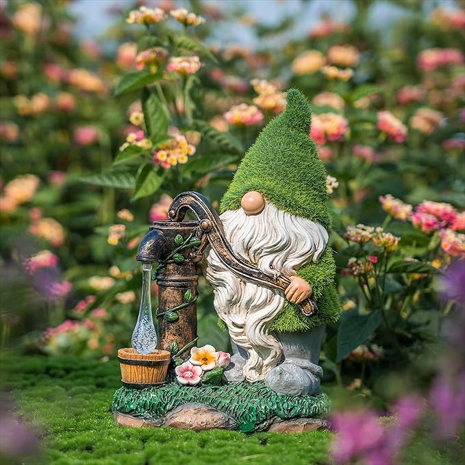 Outdoor garden gnome ornament with green hat, white beard, lantern, and flower base