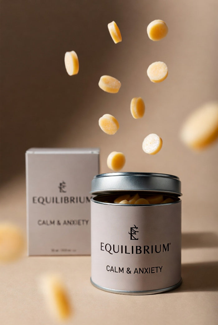 Equilibrium wellness chews shown poured from the tin