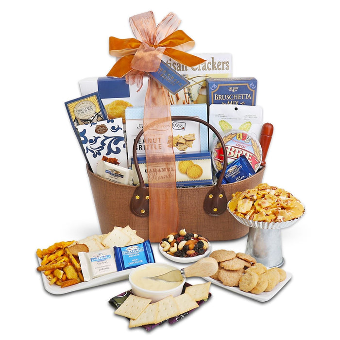 Gourmet gift basket in burlap with assorted crackers, cheese, and dip snacks