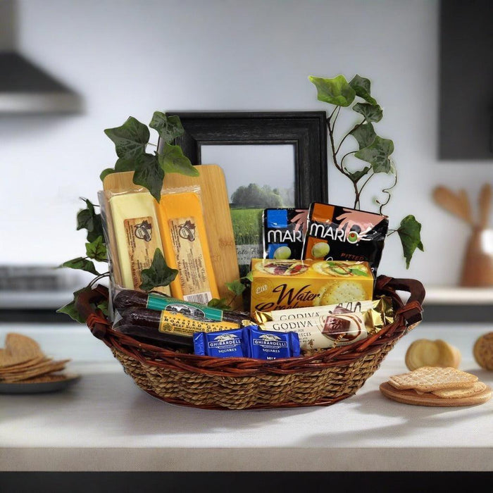 Gift basket with woven tray holding snack boxes, crackers, and a framed card
