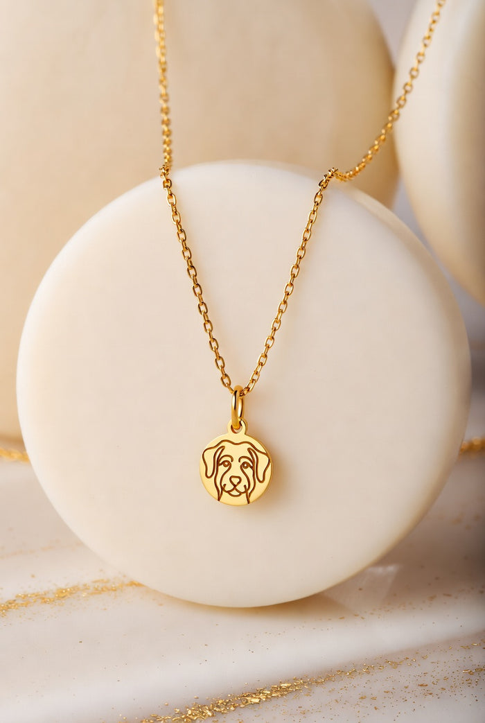 Close-up of the line-art pendant on the Lumière necklace