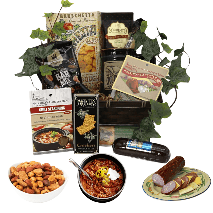 Food gift basket with assorted Italian pantry items, crackers, seasoning, and sausages