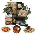 Food gift basket with assorted Italian pantry items, crackers, seasoning, and sausages