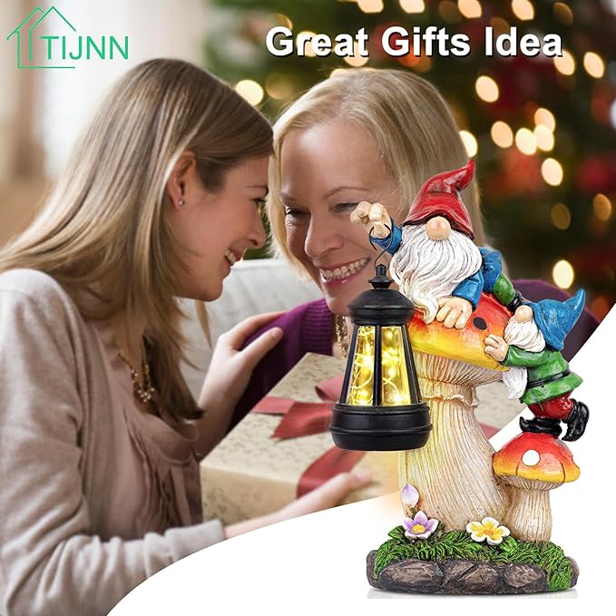 Solar gnome statue on mushroom holding a lit lantern with colorful boots and flowers