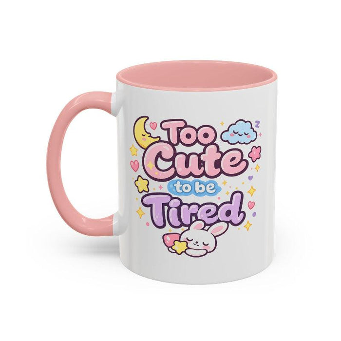 Pink-handled kawaii bunny mug with "Too Cute to be Tired" text and cloud-and-bunny design