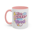 Pink-handled kawaii bunny mug with "Too Cute to be Tired" text and cloud-and-bunny design
