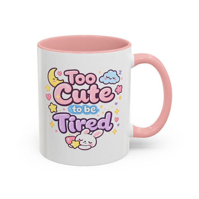 Pink-handled kawaii bunny mug with "Too Cute to be Tired" graphic and sleeping bunny