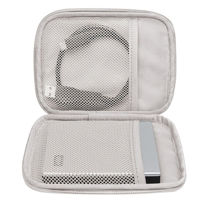 Light gray travel cable organizer pouch with open mesh pockets and zipper