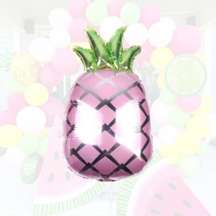 Pink mylar pineapple balloon with green foil leaves and black lattice pattern