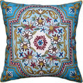 Turquoise floral embroidered pillow cover with central medallion and colorful Suzani motifs